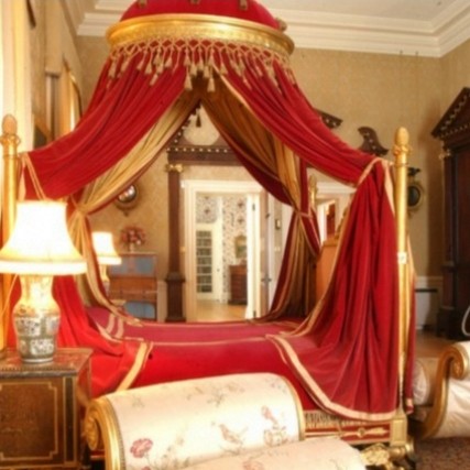Powderham Castle - state bedroom with four-poster bed
