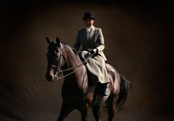 Riding side saddle